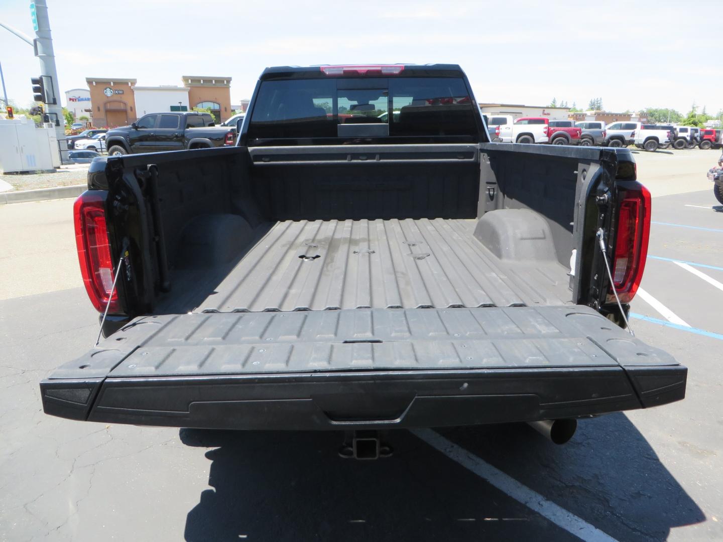 2022 BLACK /BLACK GMC Sierra 2500HD Denali Crew Cab 4WD (1GT49REY0NF) with an 6.6L V8 OHV 16 DIESEL engine, 6A transmission, located at 2630 Grass Valley Highway, Auburn, CA, 95603, (530) 508-5100, 38.937893, -121.095482 - Features a BDS 3" suspension system with Fox shocks, 20" Fuel Maverick wheels, and 35" Nitto Ridge Grappler tires. - Photo#11